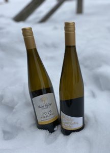 Two bottles of wine in the snow